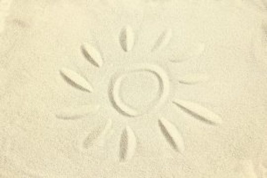 drawing on the sand by the sea travel background