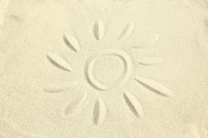 drawing on the sand by the sea travel background